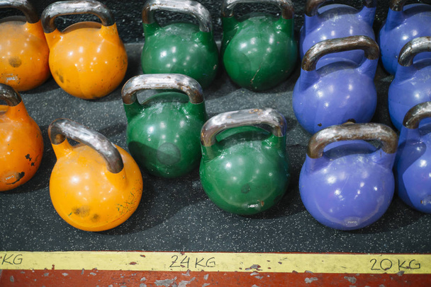 Indoor crossfit gymnasium with weight training equipment - Photo, Image