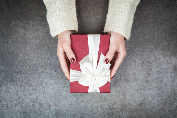 Present box in womans hands - Photo, Image