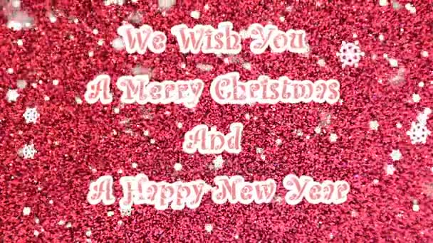 Wij wensen u een vrolijk kerstfeest en een gelukkig Nieuwjaar-tekst met het effect van sneeuw vallen op de rode achtergrond - Video