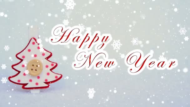 weiß frohes neues Jahr Text, dekorative rote und weiße Weihnachtsbaum und die Wirkung von fallendem Schnee - Filmmaterial, Video