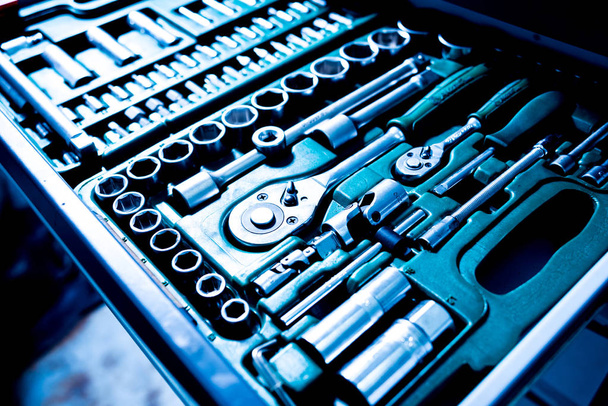  Close view of tools in auto repair service. - 写真・画像