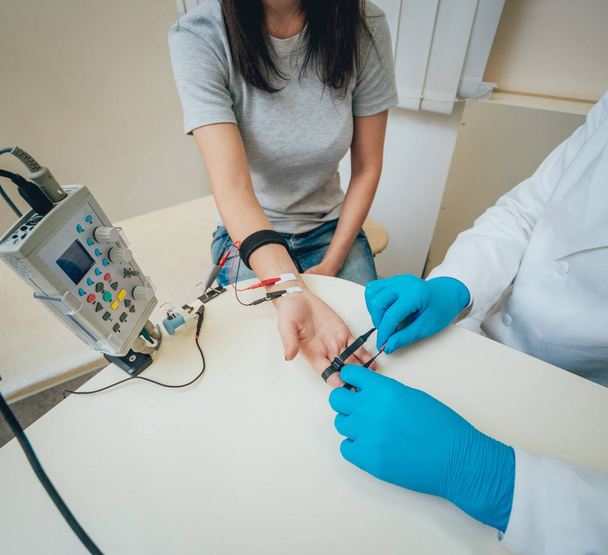 Patient nerves testing using electromyography. Medical examination. EMG - Fotó, kép