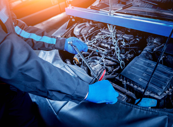Repairing engine at service station. Car repair. Background - Zdjęcie, obraz