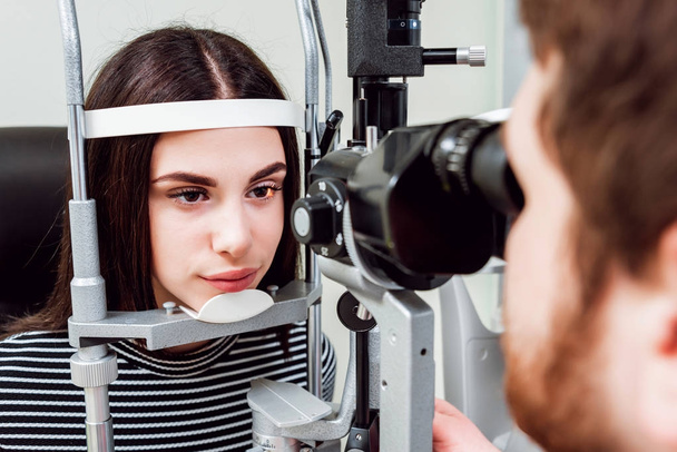 Slit lamp examination. Biomicroscopy of the anterior eye segment. Basic eye examination. Contact lenses checkup. - Фото, изображение