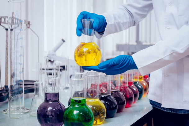 Science technician at work in the laboratory with different equipment - Foto, Bild