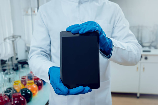 Science technician with tablet at work in the laboratory. Medical background - Fotografie, Obrázek
