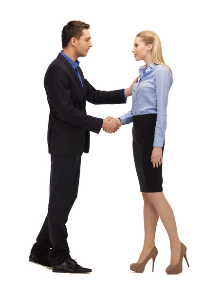 Man and woman shaking their hands - Foto, imagen