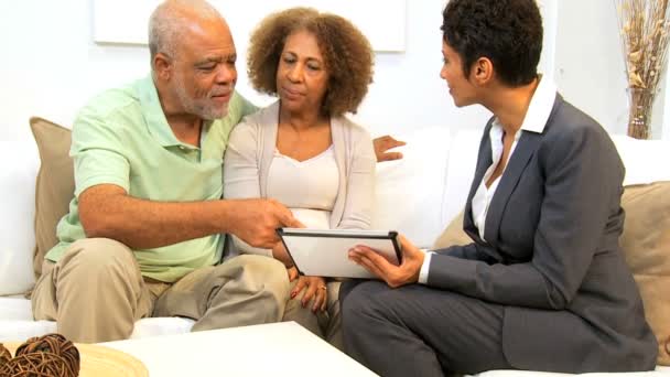 Elderly Couple Meeting Financial Advisor Home - Footage, Video