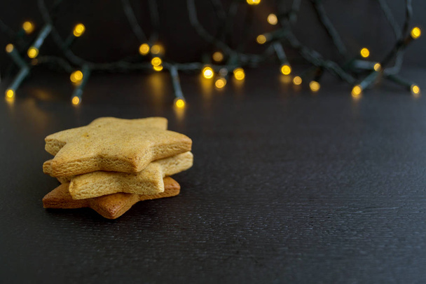 Homemade cookies on a background of blurry lights. - Fotoğraf, Görsel