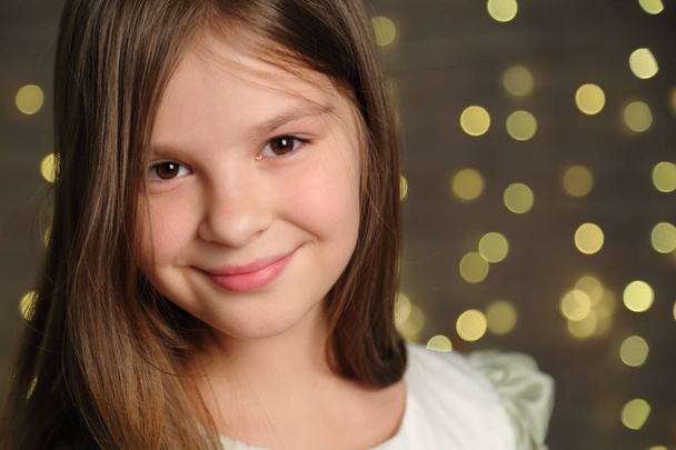Lovely caucasian little girl portrait on Christmas Holiday - Фото, изображение