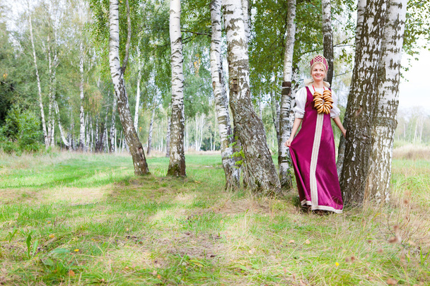 Woman in Russian traditional costume - 写真・画像
