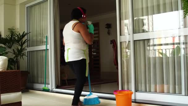 Funny Housekeeper Dancing and Having Fun With Broom - Footage, Video