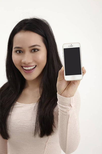 malay woman show a blank display on smartphone  - Foto, Imagem