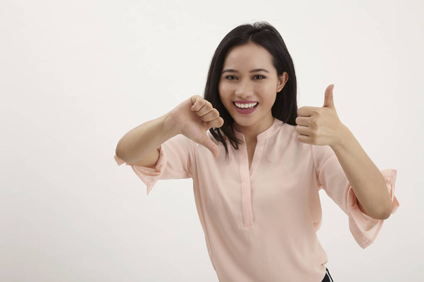  portrait of beautiful young success woman giving thumbs up standing in full length on white background - Φωτογραφία, εικόνα