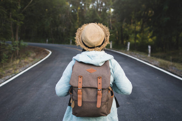 Happy hipster old women backpack traveling on the road relax time and holiday, color vintage style selective and soft focus - Fotó, kép