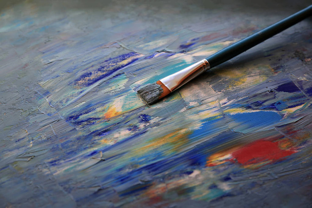 Closeup background of brush and palette. - Zdjęcie, obraz