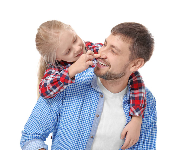 Cute little girl with her father on white background - Foto, Imagen