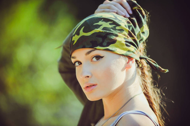 Portrait of beautiful woman military style - Photo, Image