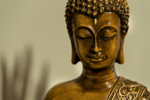 Tête de Bouddha en bronze
 - Photo, image