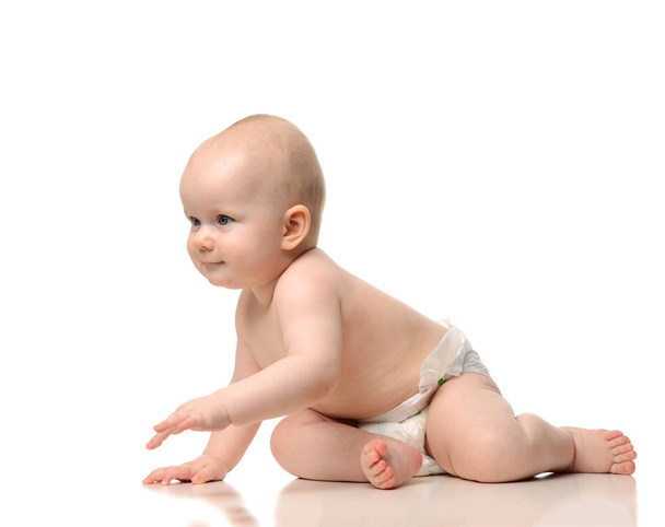 Infant child baby girl crawling and happy looking at the corner  - Φωτογραφία, εικόνα