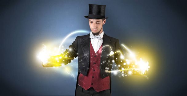 Magician holding his power on his hand - Photo, Image