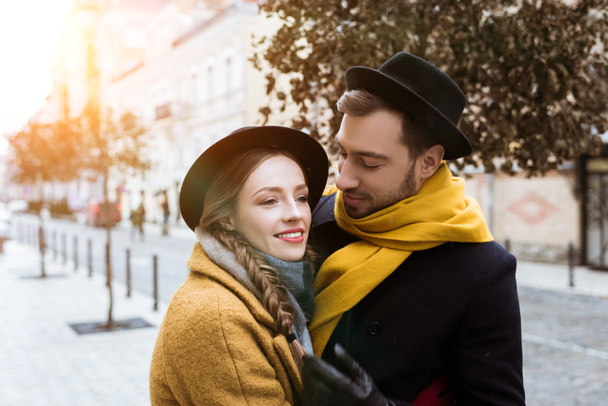 attractive young couple hugging in autumn outfit - Foto, immagini