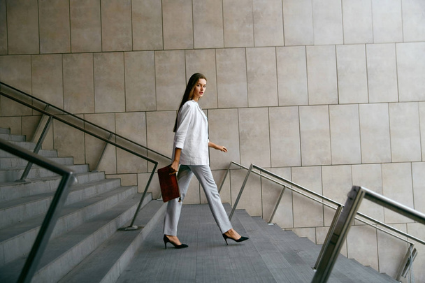 Portrait Of Stylish Business Woman With Handbag In Hand Outdoors - Фото, изображение