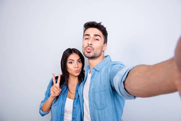 Sweet, attractive, hispanic, caucasian couple - man making self  - Foto, afbeelding