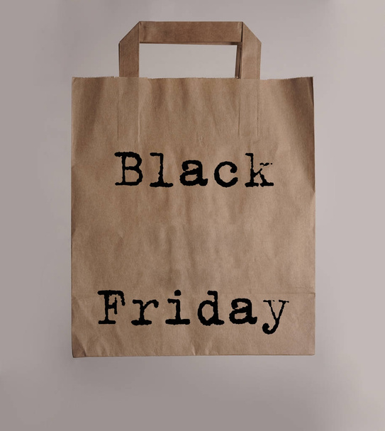 black Friday. Closeup of y  brown paper bag with text - Foto, immagini