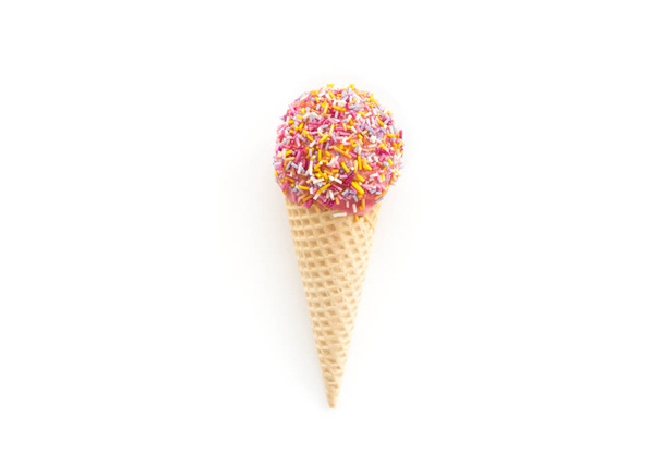 Ice Cream Cone Raspberry Ice Cream decorated with Sprinkles   - Фото, зображення