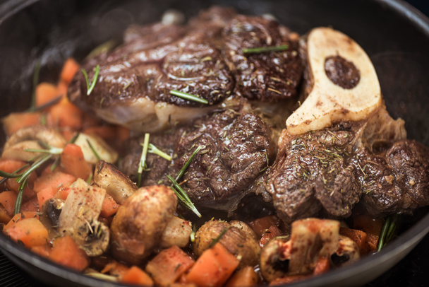 close up view of vegetables stew and meat on frying pan - 写真・画像