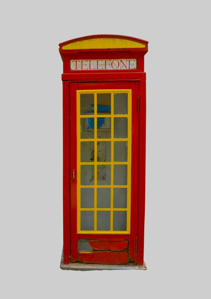 Broken telephone box on an isolated background. - Foto, afbeelding