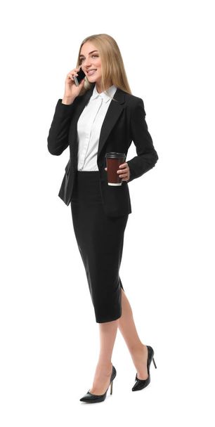 businesswoman speaking by mobile phone - Foto, afbeelding