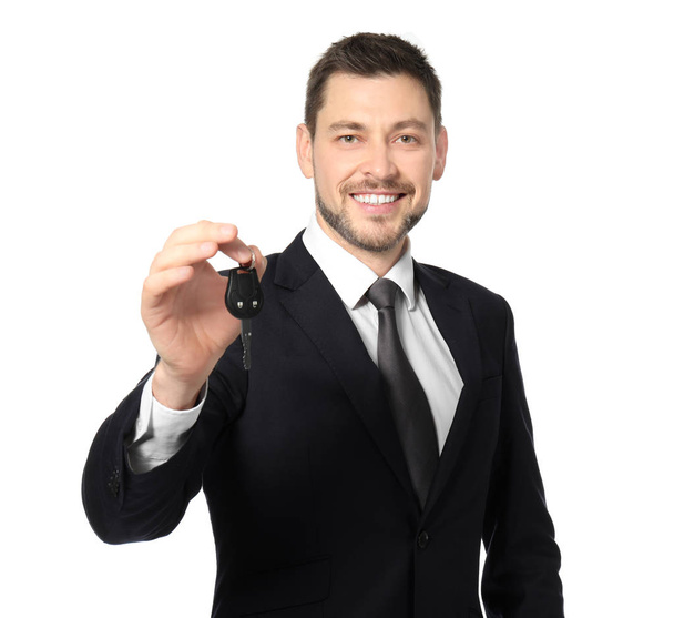 salesman holding car key - Foto, imagen