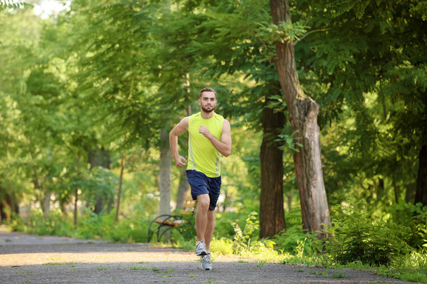 man running in park - Foto, Imagen