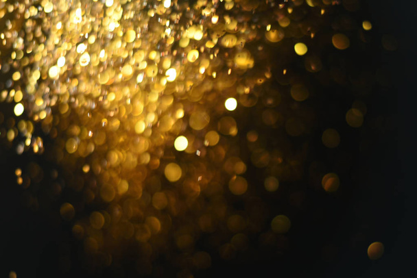 golden glitter texture Colorfull Blurred abstract background for birthday, anniversary, wedding, new year eve or Christmas. - Fotó, kép