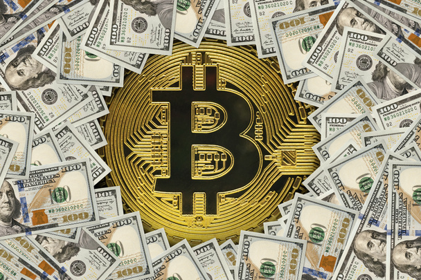 Golden bitcoin on us dollar bills - Photo, Image