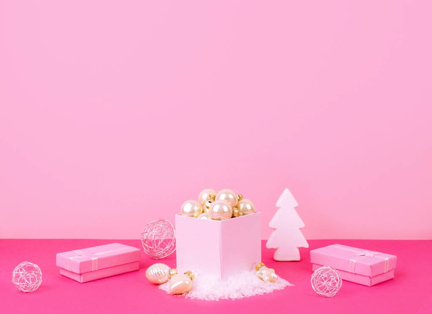 Christmas tree balls on a pink background - Fotó, kép