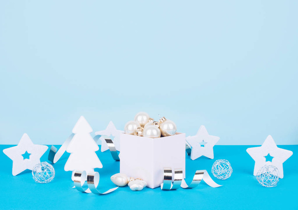 Christmas tree balls on a blue background - Valokuva, kuva
