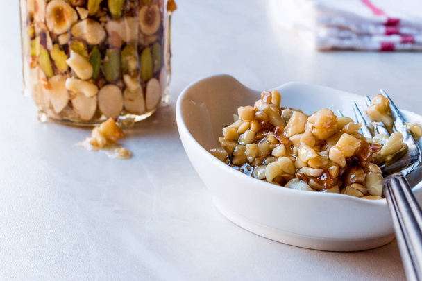 Honey Flavored Nuts, Almonds and Peanut Brittle Dessert in Jar - Foto, Bild