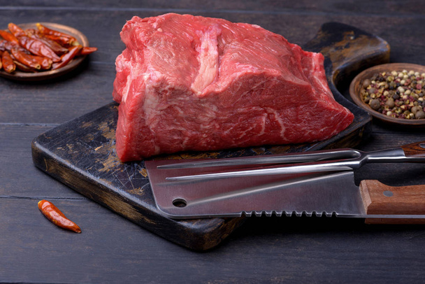 Large piece of meat on cutting board - Photo, Image
