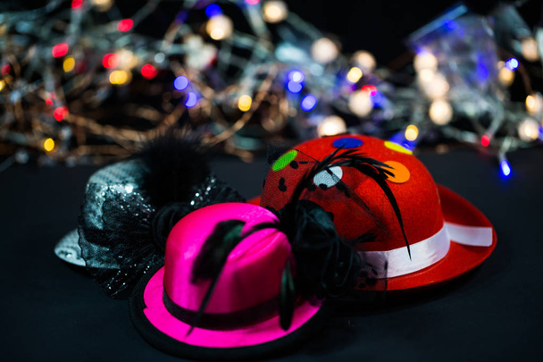 Hats on black background, carnival hats, party hats - Photo, Image