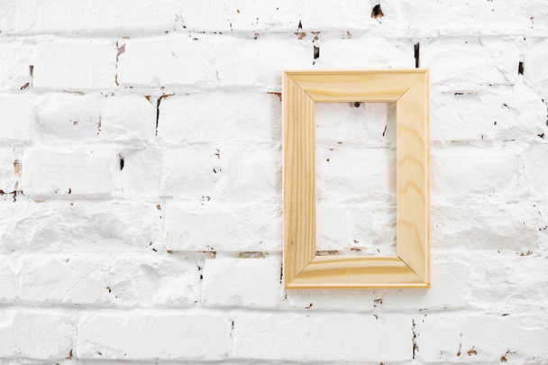 wooden frame on a waall - Foto, Bild