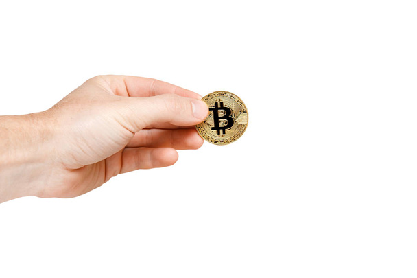 Bitcoin. Bitcoin ręką na na białym tle - Zdjęcie, obraz