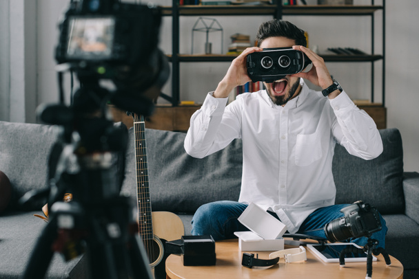 surprised technology blogger testing virtual reality headset  - Photo, Image
