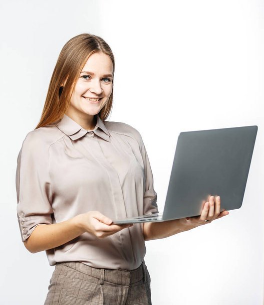 portrait of a woman administrator with laptop on white background. - Zdjęcie, obraz