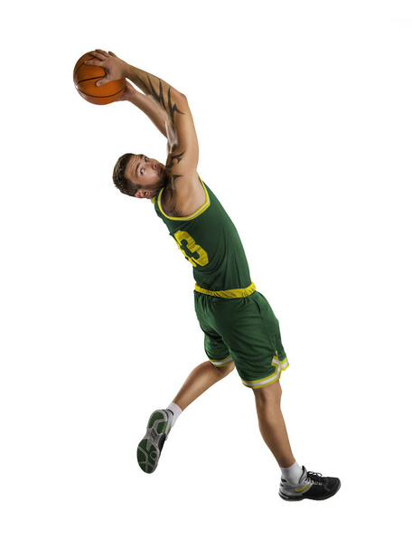 jeden basketbalový hráč skok izolace - Fotografie, Obrázek