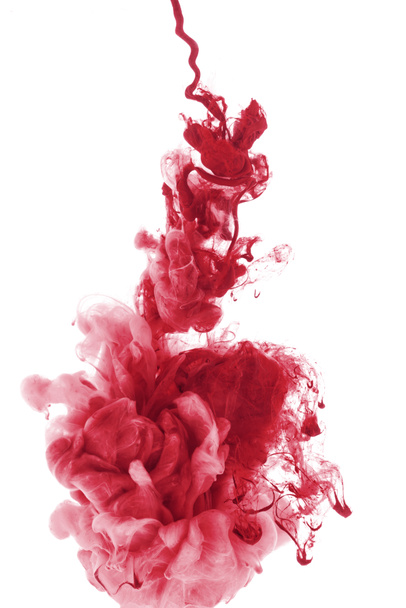 respingo de tinta vermelha na água, isolado em branco
 - Foto, Imagem