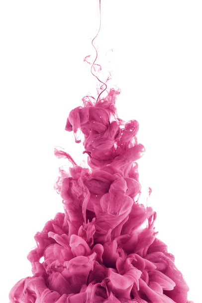 pink paint splash in water, isolated on white - Fotoğraf, Görsel