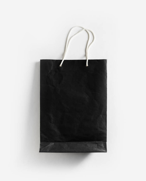 bolsa de papel negro
 - Foto, Imagen